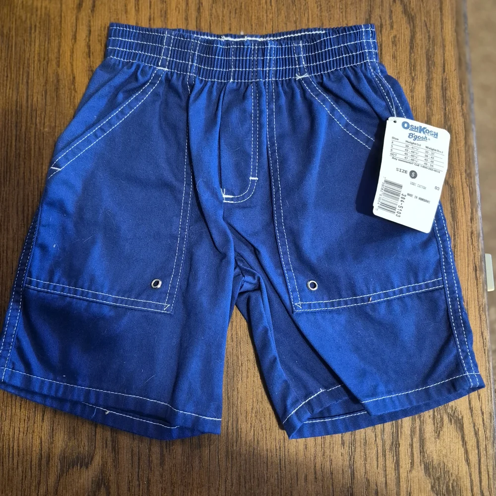 OshKosh B'gosh blue swim trunks size 5 with white stitching